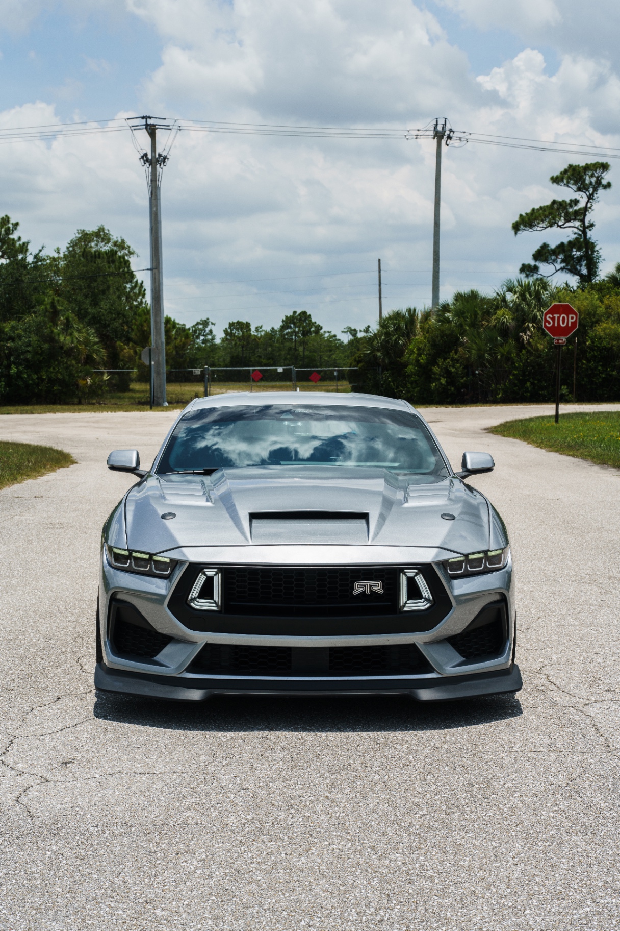 Silver 2024 Ford Mustang RTR head-on front view with ram-air hood