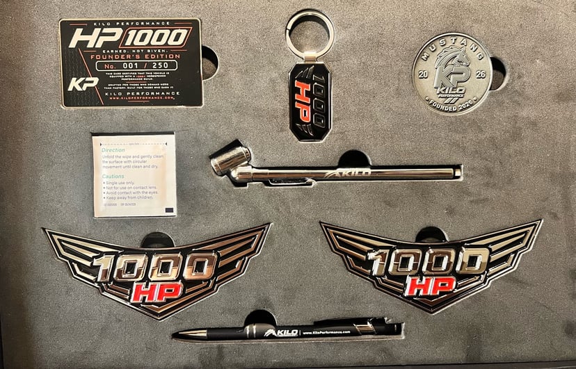 1000 HP Founder's Series — Numbered Edition — contents: two winged emblems, numbered Founder's card, Kilo Performance collector card, keychain, challenge coin, tool and pen