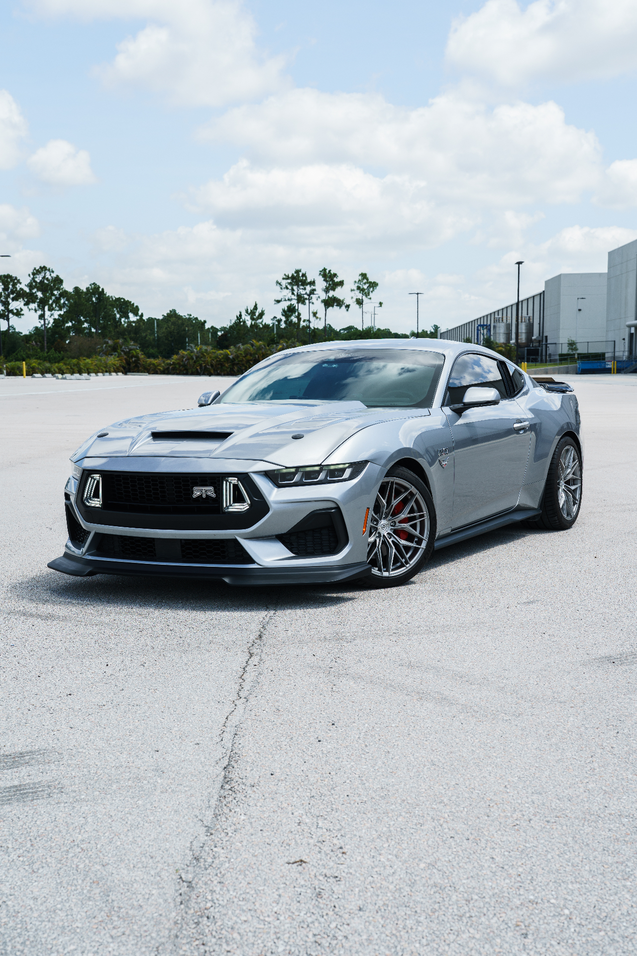 Silver 2024 Ford Mustang RTR front three-quarter parked on open lot